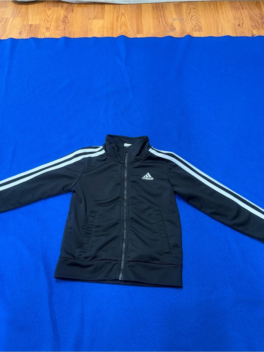 Adidas Black Jacket with White Sleeve Stripes kids 4 has flaws